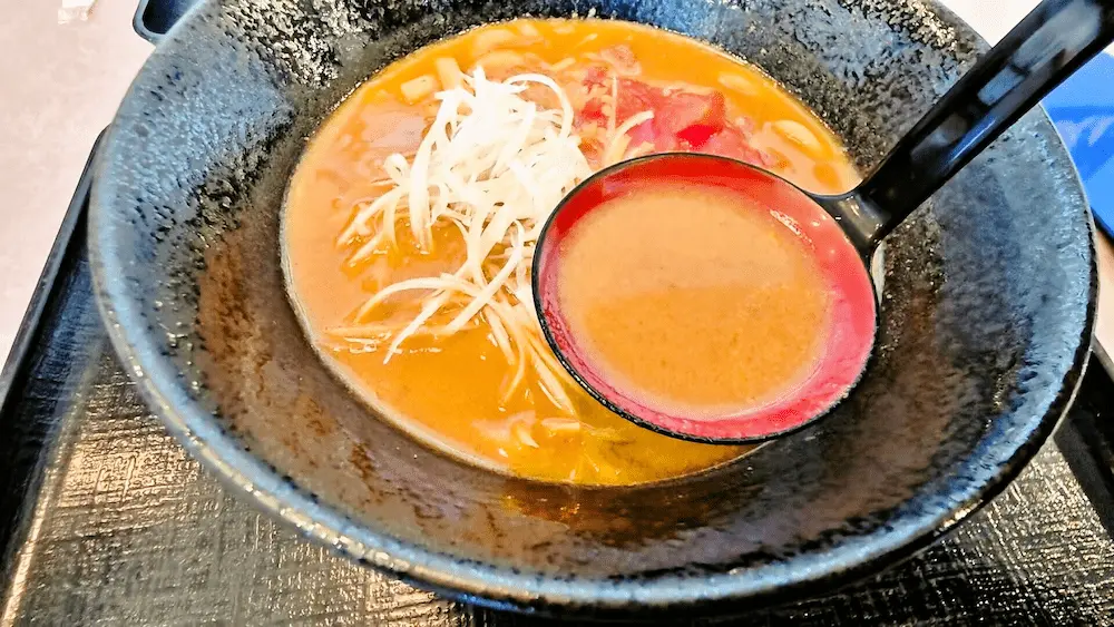 鐘壱のトマトカレーうどんのスープ